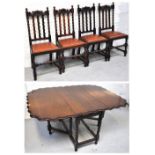 An early 20th century oak drop leaf dining table with wave edge on barley twist gate leg supports,
