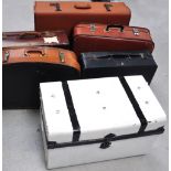 A collection of vintage suitcases,