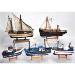 Five various scratch built models of boats to include one example named "Isles of Scilly",