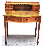 A reproduction yew wood bonheur du jour,