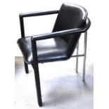 A set of four black leather and chrome framed chairs bearing label inscribed "Garantie 1 Leolux",