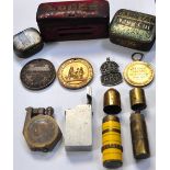 A mixed collectors lot to include a vintage cash tin, school attendance medals, an ARP badge,