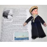 A Norah Wellings doll with velvet body and moulded head and cap inscribed "Empress of England",