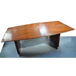 A retro 1970s teak and chrome dining table raised on twin plank and supports, 215 x 120cm.