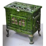An early 20th century Phebus green enamel stove on cabriole supports, height 55cm.