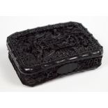 An early 19th century Chinese Canton tortoiseshell curved rectangular snuff box, finely carved