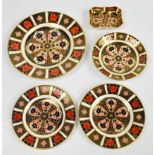 A small quantity of Royal Crown Derby items comprising a 21.5cm plate, two 15.5cm plates, a