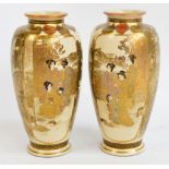 A pair of Japanese Meiji period Satsuma ovoid vases, decorated with figures and birds in a