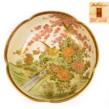 A Japanese Meiji period Satsuma lobed circular bowl decorated to the interior with pheasants in a