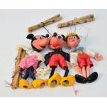 Three vintage Pelham puppets; Pinocchio, and Mickey & Minnie Mouse,