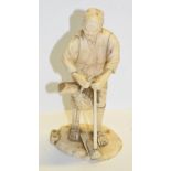 A Japanese Meiji okimono of a labourer, signed to base, height 15cm.