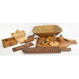 An interesting mixed lot of treen kitchenalia comprising a dough bowl, saladiere, wash board,