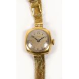 LIMIT; a lady's 9ct yellow gold cased manual wind wristwatch, the case stamped "Dennison",