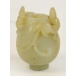 A 19th century Chinese pale green jade snuff bottle,