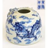 A 19th century Chinese porcelain beehive water pot, painted in underglaze blue with two