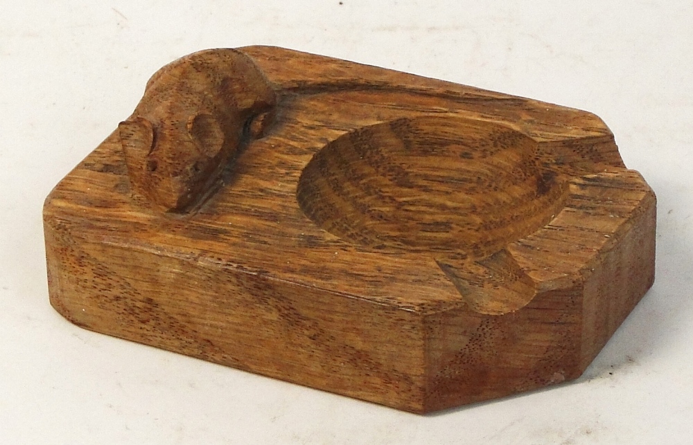 A Robert "Mouseman" Thompson carved oak ashtray, length 10cm.