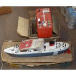 A 1956 boxed Tri-ang radio controlled cargo ship "M.S. British Adventurer", with instructions and