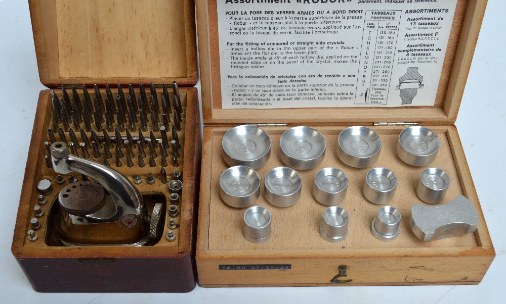 A boxed stainless steel jeweller's punch kit "Favorite" and a watchmaker's glass replacement kit