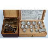 A boxed stainless steel jeweller's punch kit "Favorite" and a watchmaker's glass replacement kit
