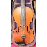 A full size German violin with spurious Bergonzi label, length of back 35.8cm, cased with two bows.