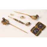 A mixed lot comprising pair of Chinese white metal hair pins, an opium pipe,