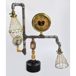 An unusual scratch built industrial "Steampunk" table lamp with twin adjustable basket shades and