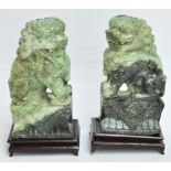 A pair of decorative 20th century Chinese carved green hardstone Buddhist lions, height 20cm,