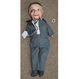 An early 20th century toy ventriloquist's dummy with composite head and arms,