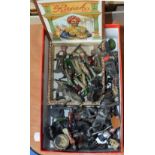 A quantity of heavily playworn toy soldiers, predominantly painted lead.