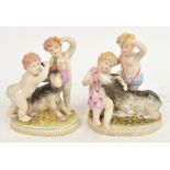 A pair of late 19th century Continental figure groups of children with goats on gilt heightened