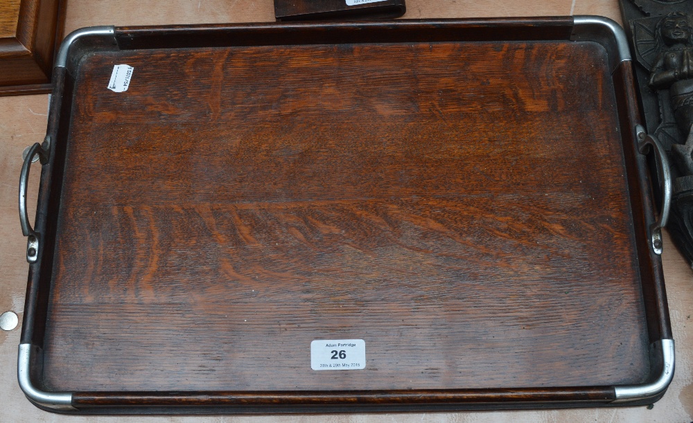 An early 20th century oak twin handled tea tray, length 45cm.