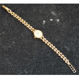 ROAMER; a lady's quartz wristwatch on 9ct gold bracelet, total weight approx 12.2g.