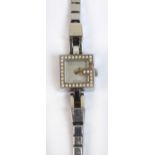 GUCCI; a lady's stainless steel quartz fashion wristwatch with diamond set bezel, no.10360203.