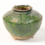 A Chinese Ming Dynasty green glazed vase of squat baluster form,