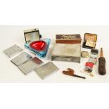 A mixed smoker's lot comprising various pocket lighters and metal cigarette cases,