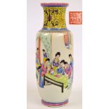 A Chinese Republic porcelain Famille Rose vase painted with robed women in a court scene beneath a