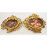 A pair of dished Vienna porcelain plaques,