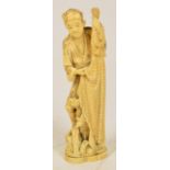 A Japanese Meiji period ivory okimono depicting a fisherman with a net of fish, signed to base,