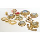 A collection of shell adorned "Valentines" and ornaments, comprising two hand mirrors, two anchors,