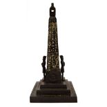 An unusual 19th century bronze table lamp modelled as an ancient Egyptian obelisk with two