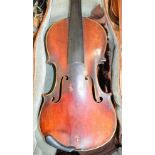 A full size German violin with two-piece back, Stradivarius copy, length 36cm, cased.