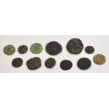 Twelve various ancient bronze coins including Heraclius, 12 Nummi, Constantine etc.