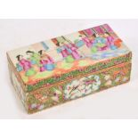A 19th century Canton rectangular box and cover, painted in Famille Rose enamels, the lid
