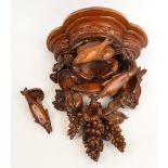 A carved beech Black Forest type wall bracket,