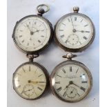 Four 19th century silver cased open face key wind pocket watches, each with white enamel dial.