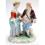 An early 20th century Dresden figure of a young couple on gilt heightened base, height 16cm.