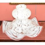 A large early 20th century glass light shade in abstract white and clear pattern,