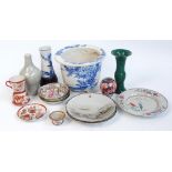 A group of Oriental ceramics to include four 19th century Canton small bowls decorated with figures,