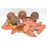 Four leather footballs, a leather rugby ball and a quantity of rubber liners.