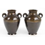 A pair of early 20th century Chinese bronze twin handled vases,